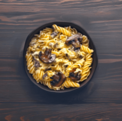 Макароны с сыром, сливками и грибами