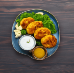 Куриные котлеты с сыром, специями и гарниром из цветной капусты