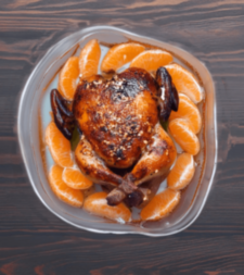 Курица, запеченная с ароматным маслом и мандаринами